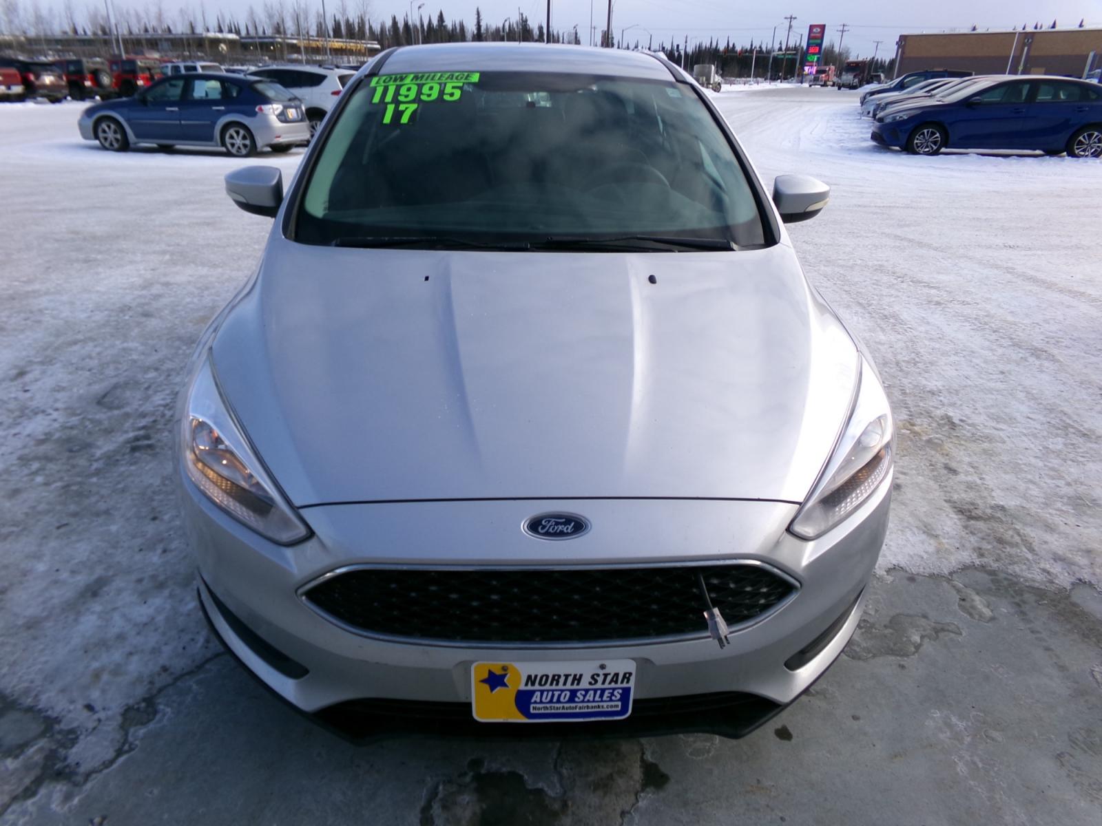 2017 Silver Ford Focus SE Hatch (1FADP3K26HL) with an 2.0L L4 DOHC 16V engine, located at 2630 Philips Field Rd., Fairbanks, AK, 99709, (907) 458-0593, 64.848068, -147.780609 - Photo #1
